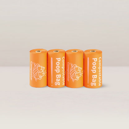Four rolls of strong and leak-proof compostable dog waste bags in bright orange